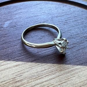 14K white gold
.25 ct. marquise diamond
Size 8